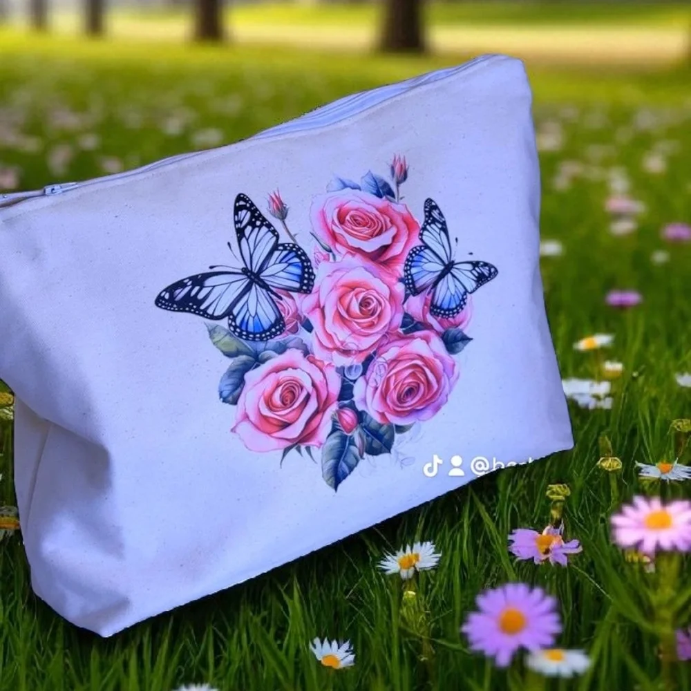 Chic White Cosmetic Bag with Floral and Butterfly Design